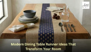 A modern dining table runner with a navy blue paisley motif down the center of a natural burlap fabric, showcased on a live-edge table as a home decor blog thumbnail.