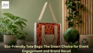 An orange printed handcrafted jute bag styled with a small moss globe and recycling symbol to highlight eco-friendly tote bags for event engagement and branding.