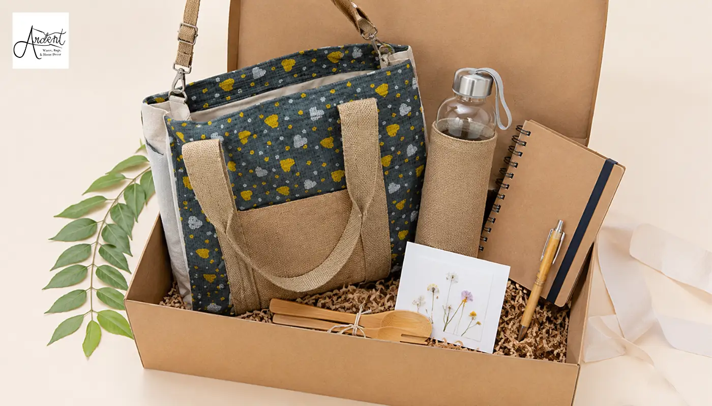 Corporate event swag gift box containing a bulk branded tote bag for conferences, a matching water bottle, a kraft notebook, and bamboo cutlery.